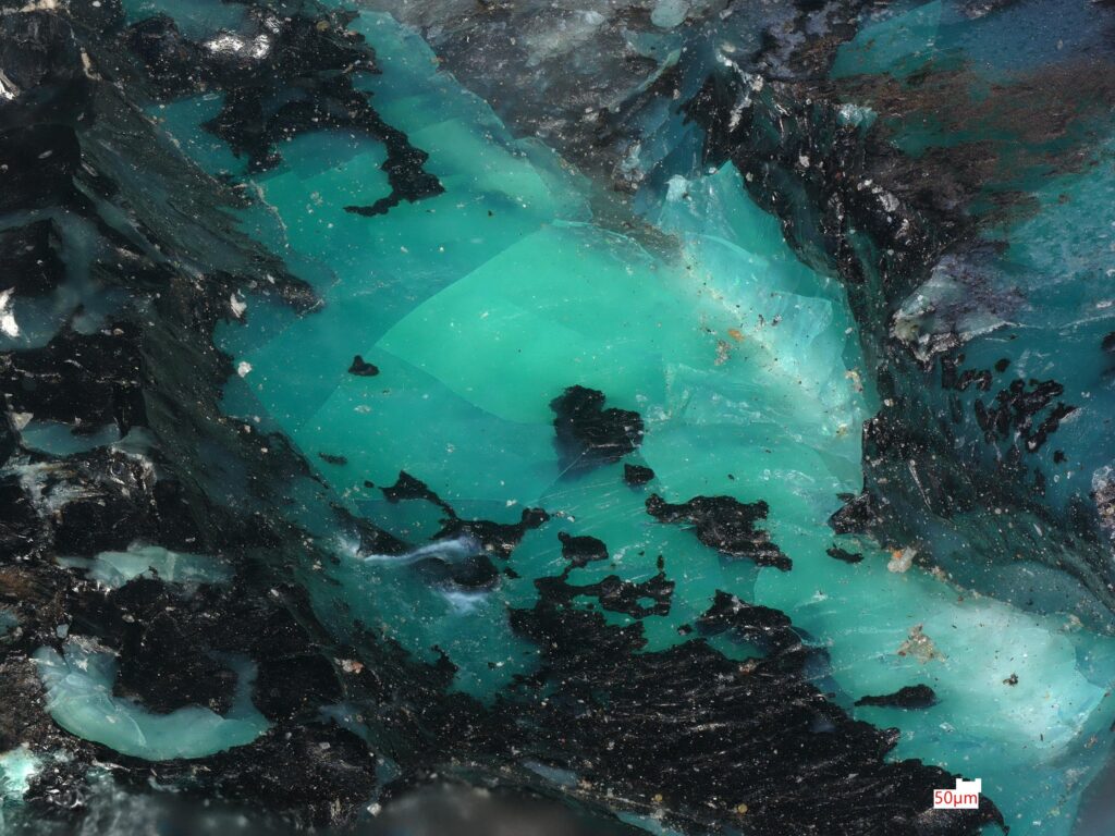 Malachite crystal viewed under a microscope.